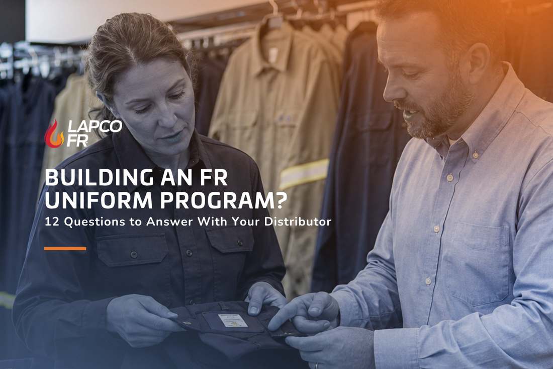 Safety manager and industrial distributor reviewing flame-resistant garments and product labels for an employee uniform program.